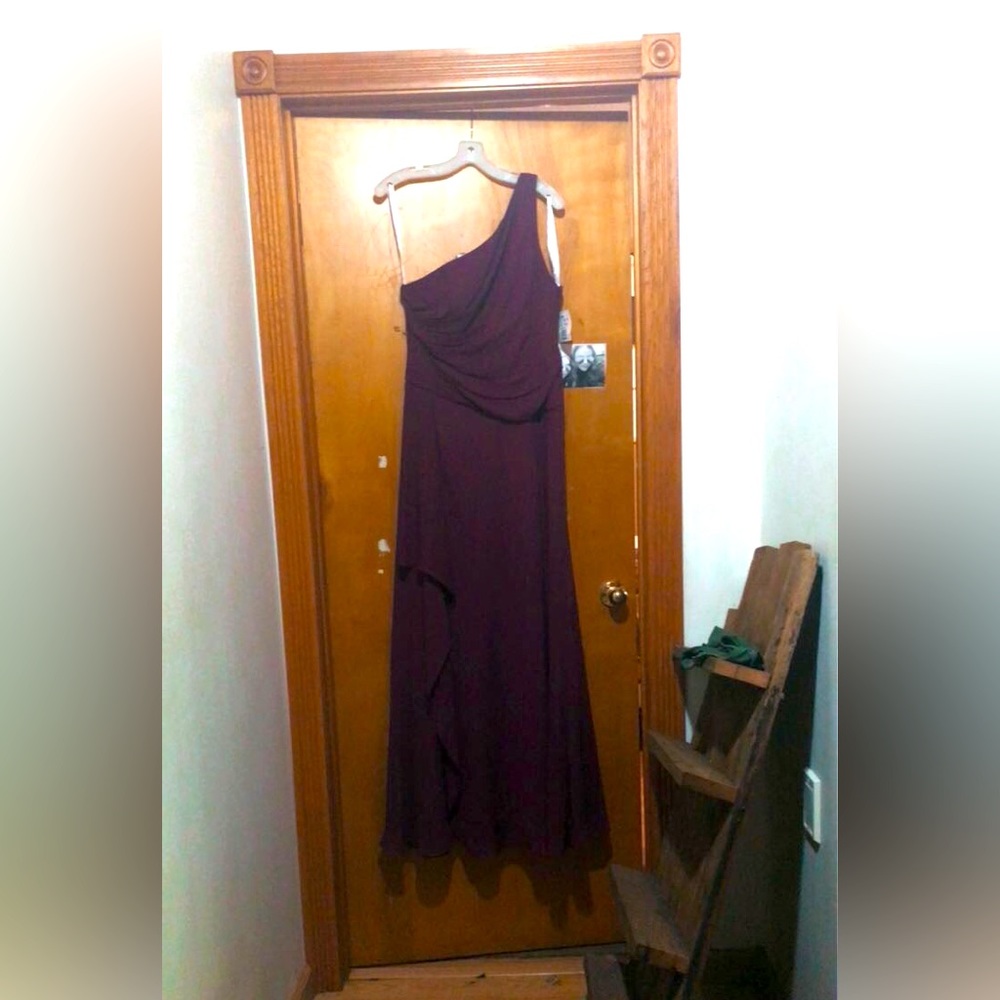 This is a very flattering wine dress I love it and she will be missed enjoy!!